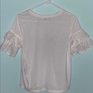 white ruffled t